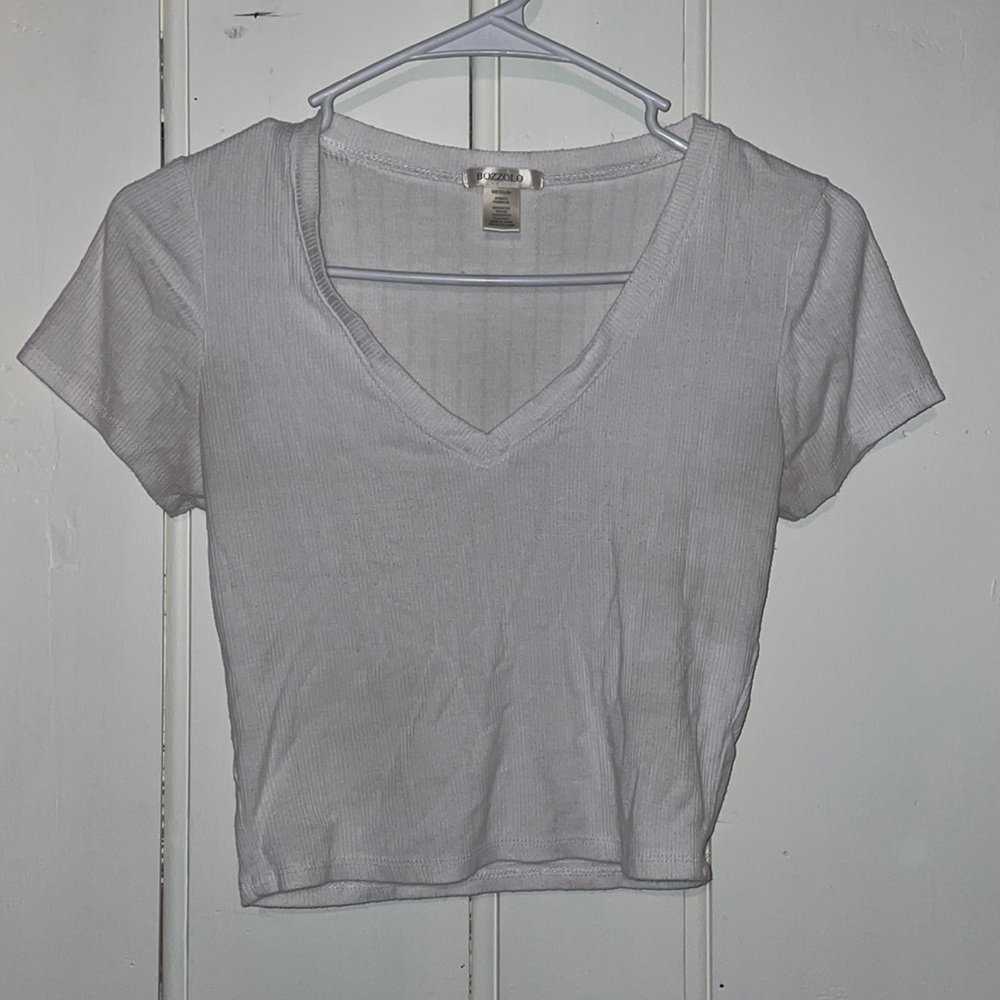 Size medium woman’s white crop top.